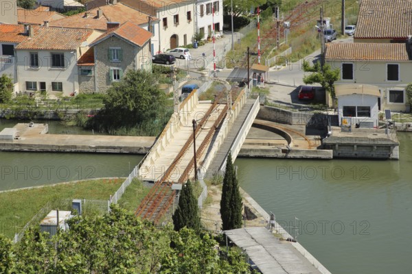 View of railway swing bridge over the Canal du Rhone a Sete, canal with swing bridge, track,