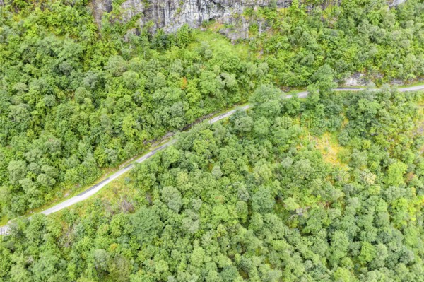 Aerial view of road above lake Lovatnet (or: Loenvatnet), valley Lodalen south of village Loen,