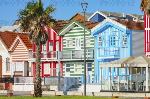 Brightly painted beach homes, Costa Nova do Prado, Aveiro, Portugal, Europe