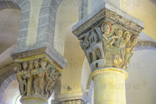 Colourfully painted capitals in the Romanesque church of Saint-Nectaire, Département Puy-de-Dôme,