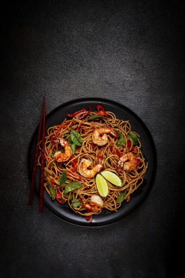 Fried udon noodles with shrimp and vegetables, Asian cuisine, homemade, no people