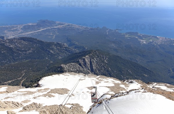 View of the Turkish Riviera from the snow-covered Tahtali Dagi, cable car, Turkey, Asia