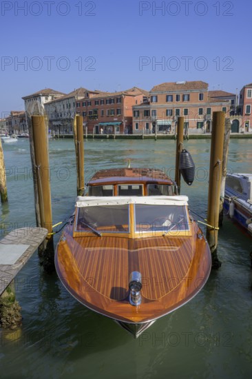 Wooden boat on the Grand Canal, Murano, Venice, Metropolitan City of Venice, Italy, Europe