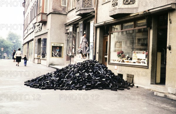 Delivery of coal, piled up on the street in front of shops Rottweil, Baden-Württemberg, Germany,