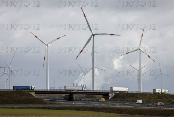 Grevenbroich, North Rhine-Westphalia, Germany - Truck on motorway and wind farm in front of RWE