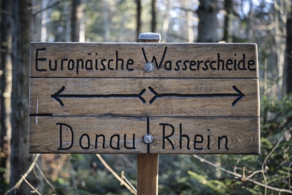 Sign and geological marker with the inscription European watershed, Danube and Rhine on the 980