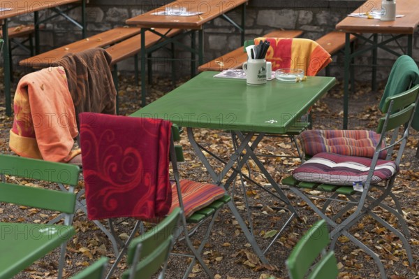 Autumn in a garden pub, chairs furnished with blankets, Regensburg, Upper Palatinate, Bavaria,