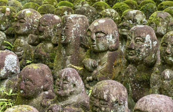 Moss-covered stone statues of rakans, the disciples of Buddha, Otagi Nenbutsu-ji temple, Kyoto,
