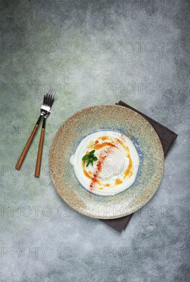 ?ilbir, traditional Turkish breakfast, Turkish eggs with yogurt and butter, homemade, no people