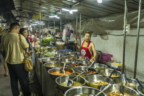 Buffet with street food at the night market in Luang Prabang, Laos, Asia