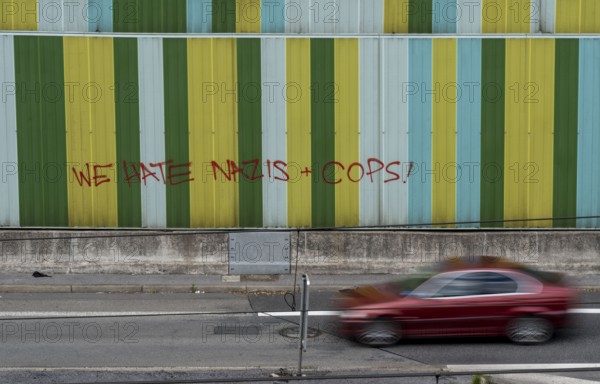 Motorway A40, Ruhrschnellweg, in the through road in Essen, noise barrier, with the slogan, we hate