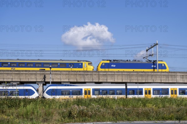 Trains of the Dutch railway, NS, Nederlandse Spoorwegen N.V., on a double-decker track, below local