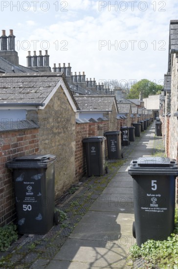 Rubbish bins in back alley of nineteenth century model worker's housing, Railway Village Swindon,