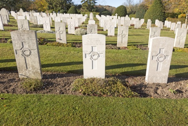Rows of gravestones at Tidworth military cemetery, Tidworth, Wiltshire, England, UK