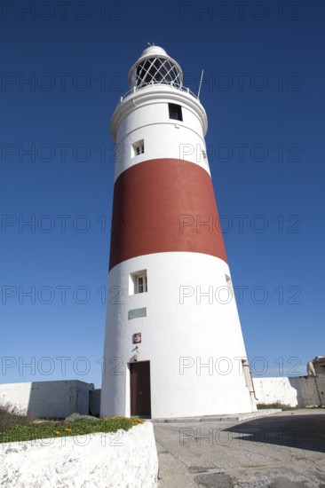 Red and white striped lighthouse at Europa Point, Gibraltar, British terroritory in southern Spain,