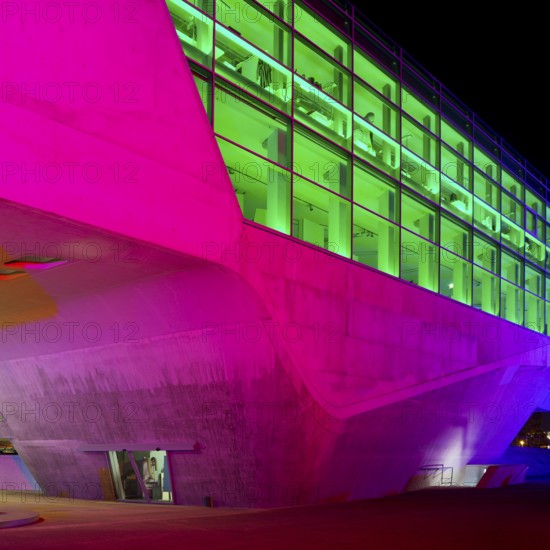The colourfully illuminated phæno building, an experimental landscape and a science centre in the
