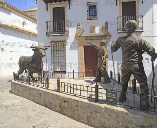 Sculpture of two men and bull, village of Grazalema, Cadiz province, Spain celebrating local