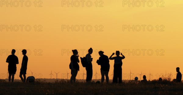 The Drachenberg in Berlin is well visited at sunset. A wind farm near Nauen in Brandenburg can be