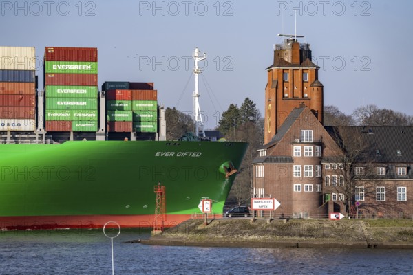 Container ship Ever Gifted, enters the port of Hamburg on the Elbe, shipping company Evergreen,