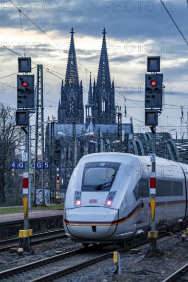 ICE train on the track in front of Cologne Central Station, Hohenzollern Bridge, Cologne Cathedral,