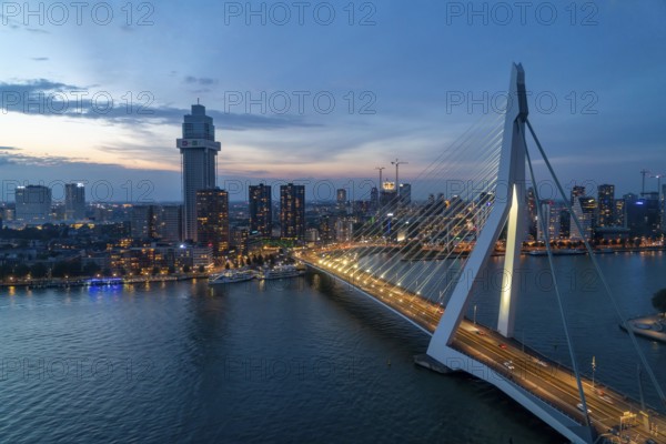 The skyline of Rotterdam, with the Erasmus Bridge over the Nieuwe Maas, Netherlands