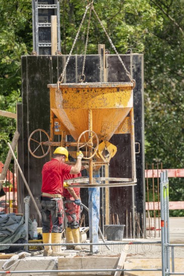 Construction site, concreting, ceiling of a building is concreted, the concrete is placed on the