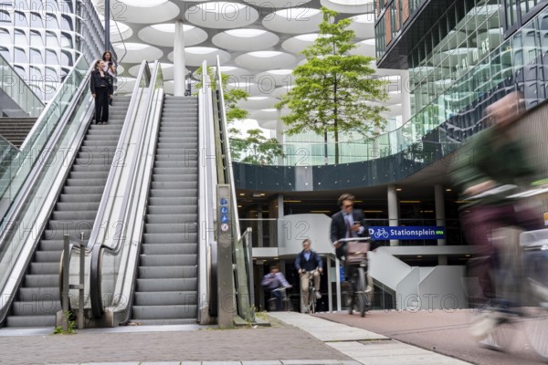 Entrance and exit of the bicycle car park at Utrecht Centraal station, Stationsplein, over 13, 000