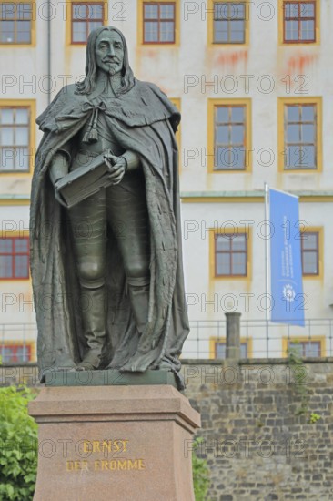 Monument to Duke Ernst I the Pious of Saxe-Gotha-Altenburg, sculpture with book and inscription,