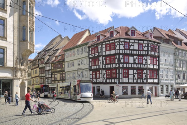 Half-timbered houses with tram and people with prams, rails, Marktstraße, Domplatz, Erfurt,