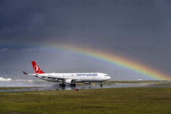 Turkish Airlines Airbus A330-303, TC-JOJ, on the west runway, rainbow, Frankfurt am Main Airport,