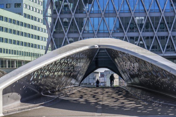 The Parkbruk, cycle and pedestrian bridge in the city centre of Antwerp, crosses a multi-lane city