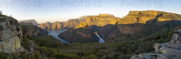 Panorama, sunset at Blyde River Canyon with Three Rondawels peak, view of canyon with Blyde River