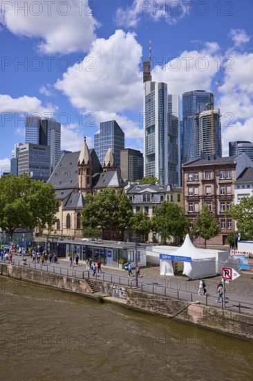 Main and skyscrapers with fan mile for the European Football Championship under a blue sky with