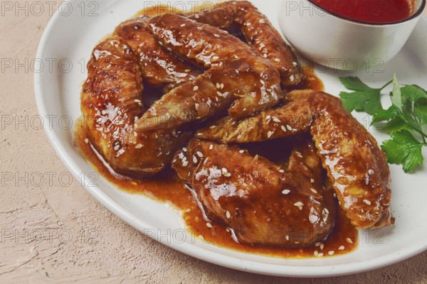 Chicken wings, with barbecue sauce, with tomato sauce, fast food, no people