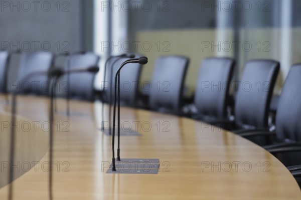 Microphones and seats in a hearing room in the Marie-Elisabeth-Lüders-Haus