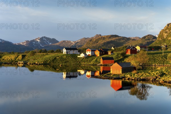 Landscape on the Lofoten Islands near Eggum. Houses on a fjord. At night at the time of the