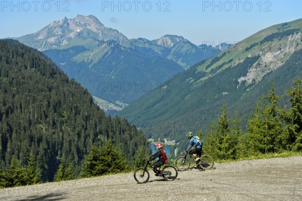 Two mountain bikers on a descent in the Chablais Geopark, Montriond, Chablais, France, Europe