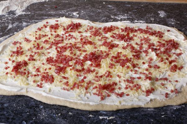 Swabian cuisine, preparation of savoury yeast plait with smoked meat, salty wreath bread, yeast