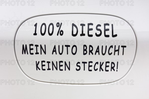 Petrol cap sticker on car from e-car opponent, electric car opponent with inscription: !00% Diesel.