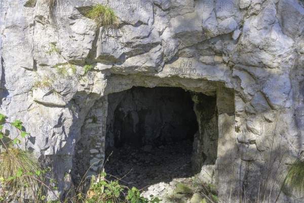 Entrance to a tunnel from the 1st World War on the Meatte hiking trail, Pieve del Grappa, province