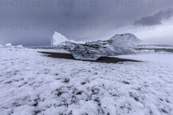 Ice floes on the beach, snowy, waves, sea, clouds, winter, Diamond Beach, Breidamerkursandur,