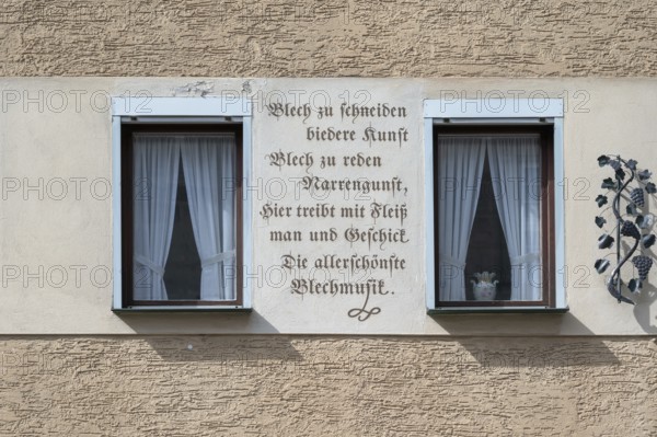 Slogan on a house of a manufacturer of metal wind instruments, Iphofen, Lower Franconia, Bavaria,
