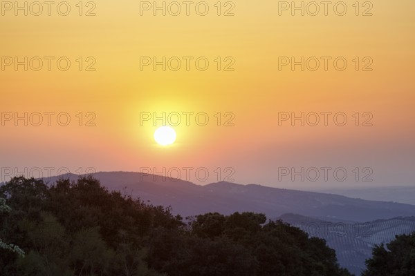 Sunset over mountain range, Sierras Subbeticas Natural Park, near Zuheros, Cordoba province,