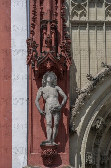 Sculpture of Adam at the entrance portal of the Gothic St Mary's Chapel, Würzburg, Lower Franconia,