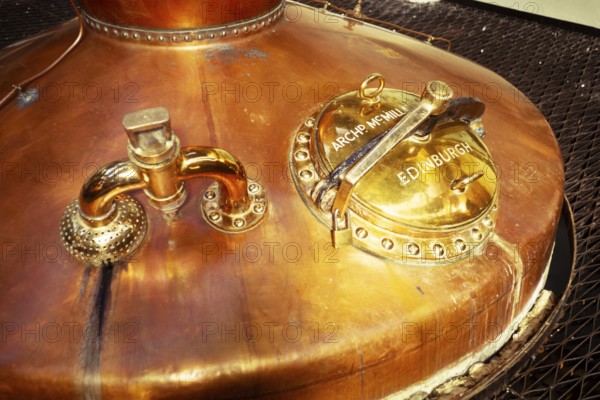Copper whisky still, manufactured by Archibald McMillan in Edinburgh, Scotland, United Kingdom in