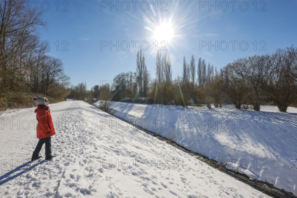 Bochum, North Rhine-Westphalia, Germany - Sunny winter landscape in the Ruhr area, walker, a senior