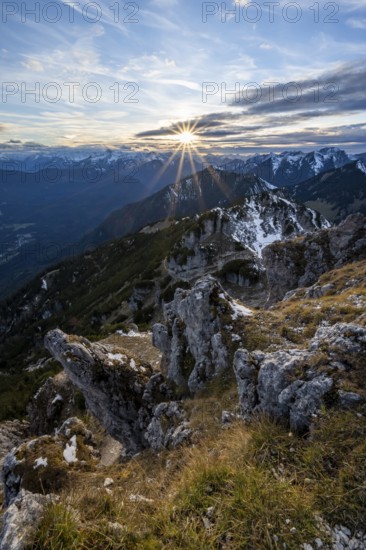 Mountain panorama, mountain landscape with sun star at sunset, at the summit of the Kramerspitz, in