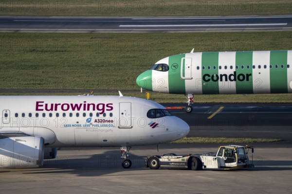 Düsseldorf Airport, Condor and Eurowings aircraft on the apron, taxiway, North Rhine-Westphalia,