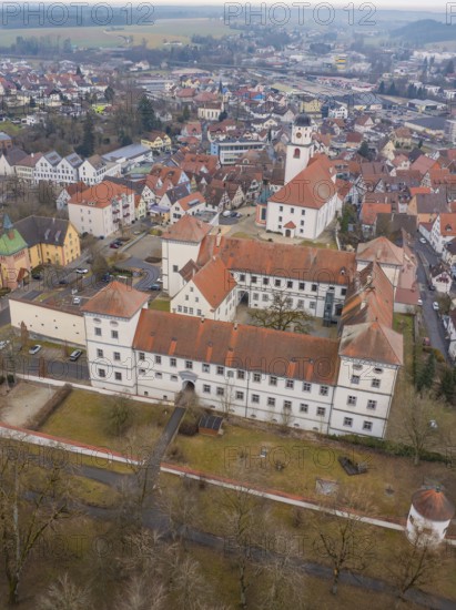 Central urban view with a prominent castle and a church between town buildings, Meßkirch, district