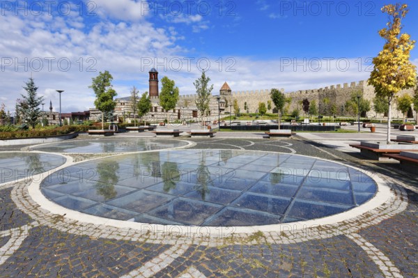 Reflections in the glass grounded Kale city park and Erzurum byzantine castle, Anatolia, Turkey,